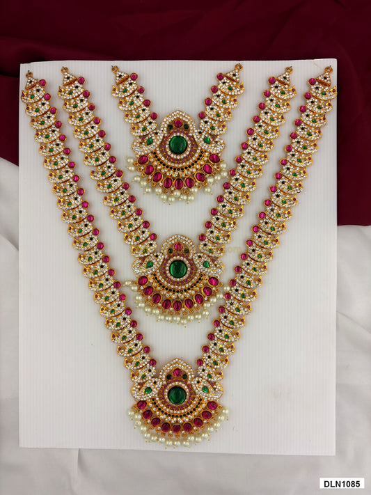 3 step deity long haram DLN1085 full product view with pink, green and gold stone work and gold plating for idol alankaram
