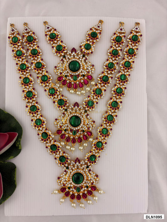 3 step deity long haram DLN1095 full product view with green, pink and gold stone work and gold plating for idol alankaram