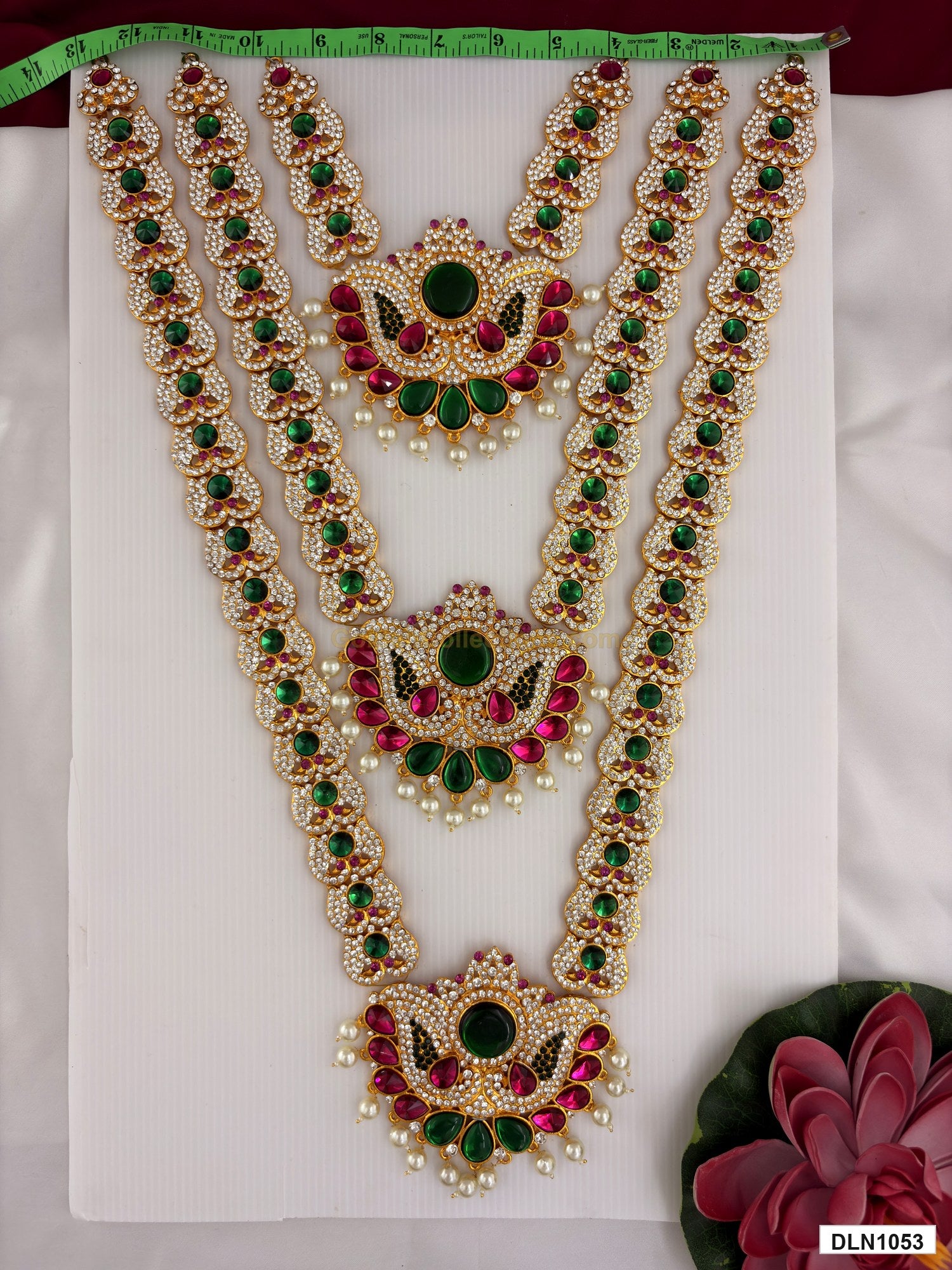 Width measurement photo showing 12 Inches deity long haram with measuring tape for idol alankaram