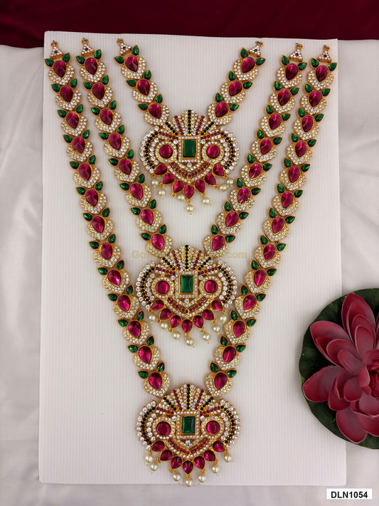 3 step deity long haram DLN1054 full product view with pink, green and gold stone work and gold plating for idol alankaram
