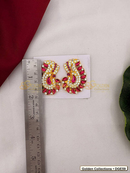 Close-up detail of Karna Pathakam Deity Earrings with Pink Green Stones 2 x 1 inches DGE59 from Golden Collections
