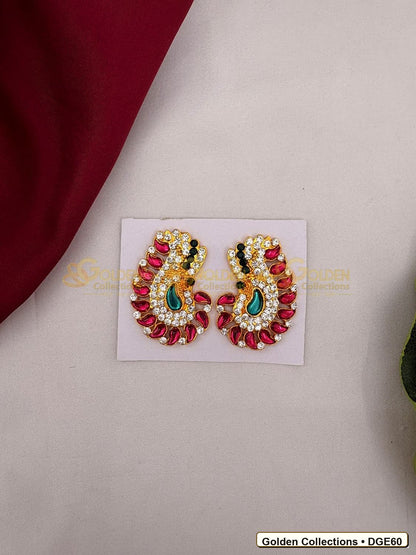 Close-up detail of Karna Pathakam Deity Earrings with Pink Green Stones 2 x 1 inches DGE60 from Golden Collections