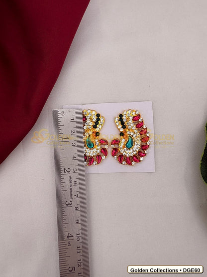 Close-up detail of Karna Pathakam Deity Earrings with Pink Green Stones 2 x 1 inches DGE60 from Golden Collections