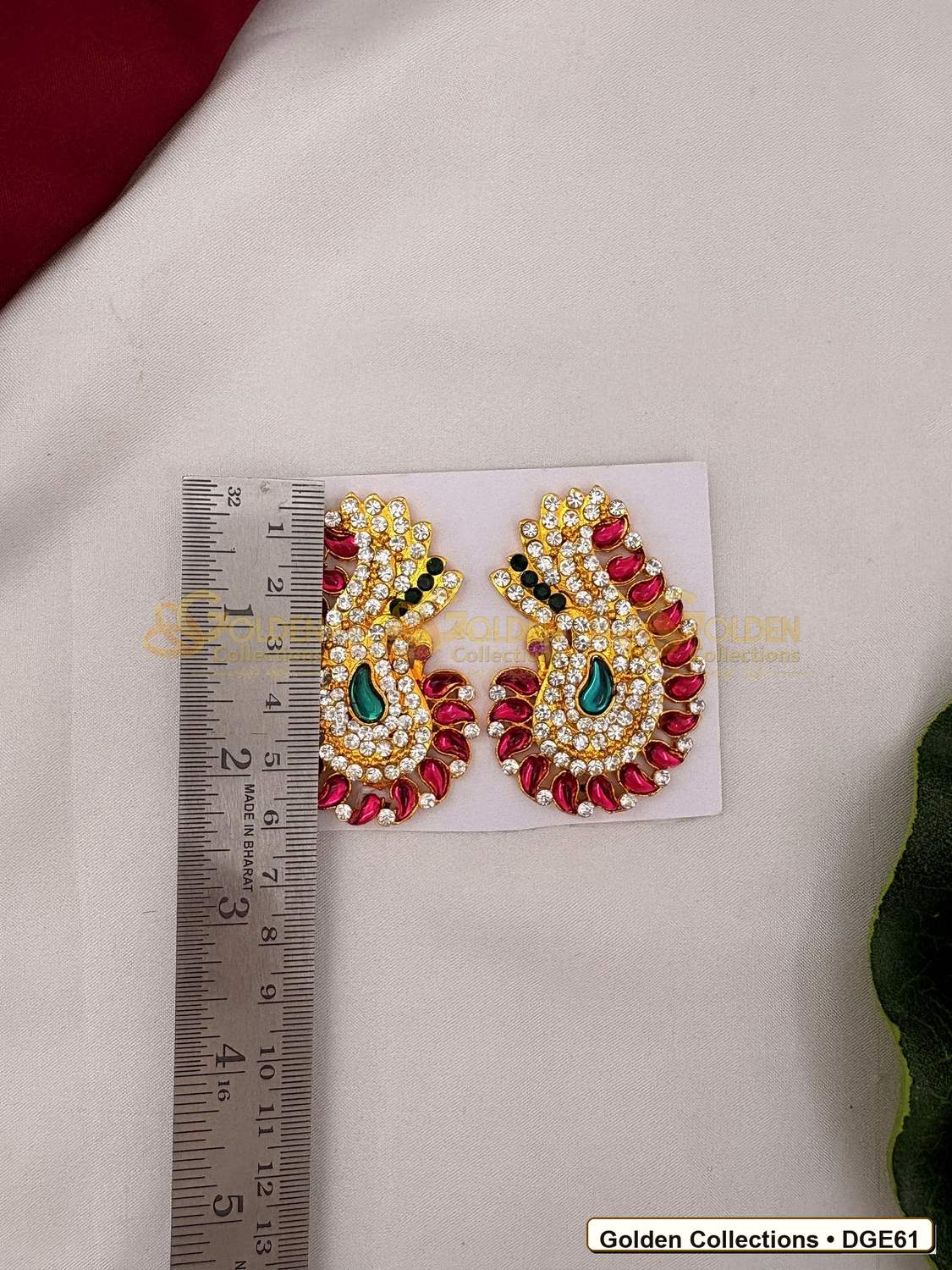 Close-up detail of Karna Pathakam Deity Earrings with Pink Green Stones 2.5 x 1.5 inches DGE61 from Golden Collections
