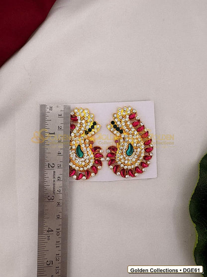 Close-up detail of Karna Pathakam Deity Earrings with Pink Green Stones 2.5 x 1.5 inches DGE61 from Golden Collections