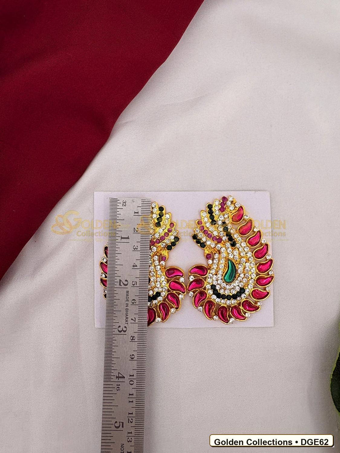 Close-up detail of Karna Pathakam Deity Earrings with Pink Green Stones 3 x 2 inches DGE62 from Golden Collections