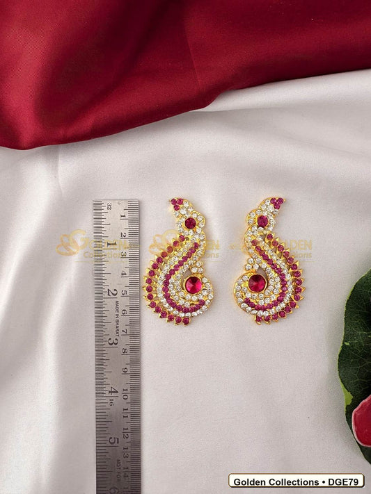 Close-up detail of Karna Pathakam Drop Deity Earrings with Pink Stones 2.5 x 1.5 inches DGE79 from Golden Collections