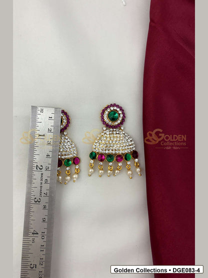 Measurement photo showing 6 Cms dome deity earrings with pink green stones for idol alankaram for deity idol alankaram