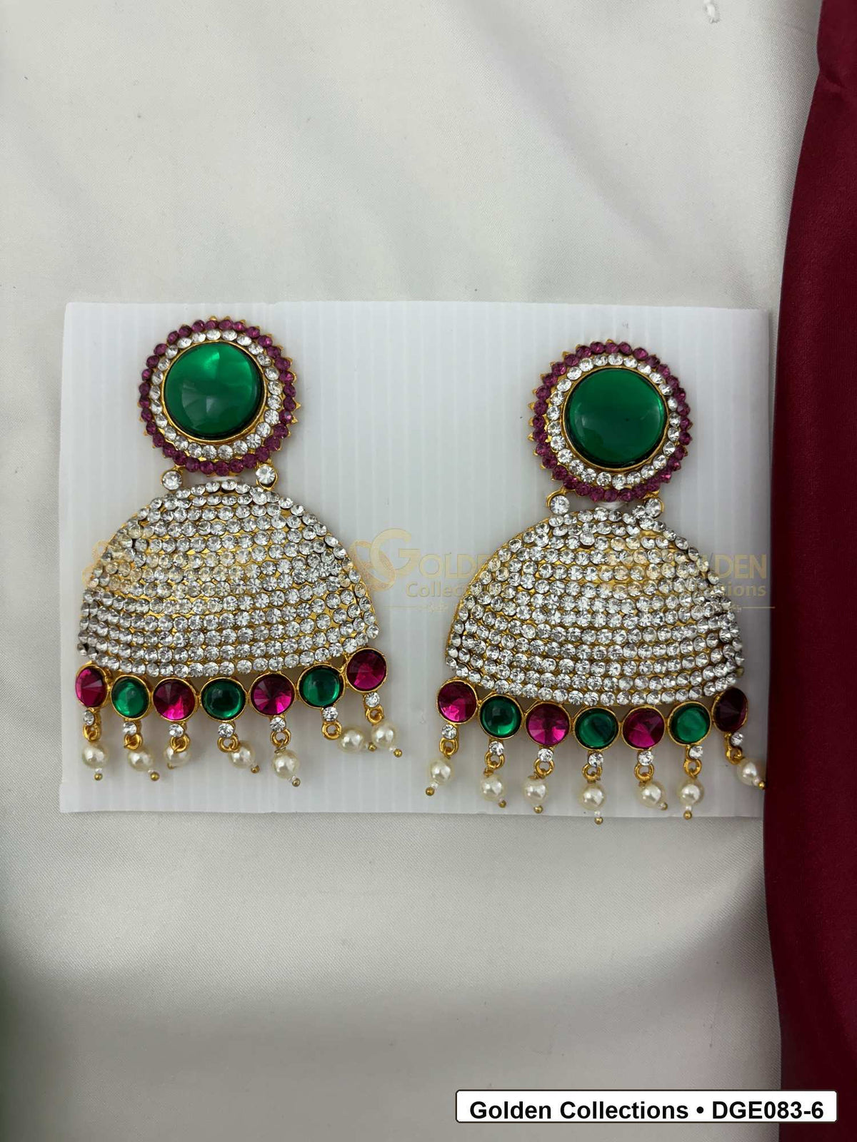 Dome Deity Earrings with Pink Green Stones for Idol Alankaram front view showing 9 Cms variant for deity idol alankaram