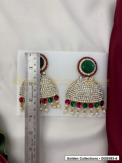 Measurement photo showing 9 Cms dome deity earrings with pink green stones for idol alankaram for deity idol alankaram