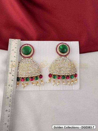 Measurement photo showing 11 Cms dome deity earrings with pink green stones for idol alankaram for deity idol alankaram