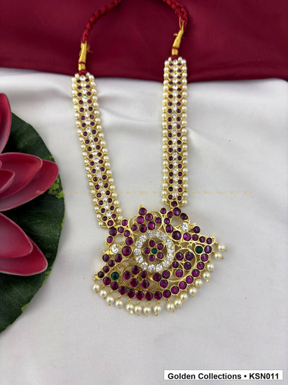 Front view of Double Line Real Kemp Short Necklace with Temple Pendant from Golden Collections