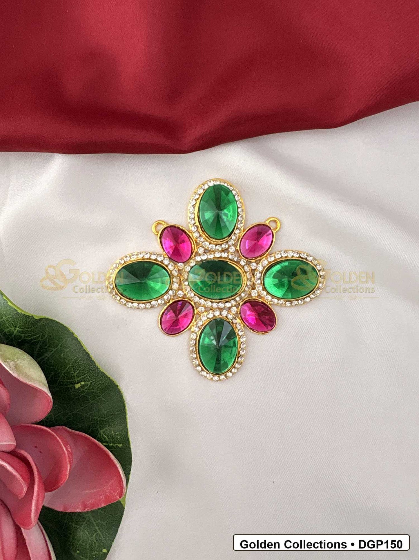 Floral Green and Pink Stone Deity Pendant for Idol Alankaram front view showing floral deity pendant with green and pink stones, clear stone border and gold-tone setting for idol alankaram