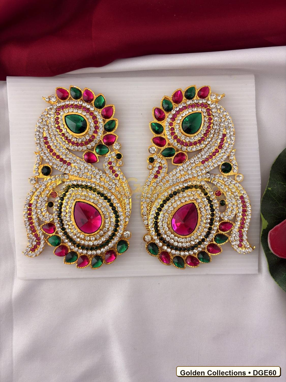 Front view of Karna Pathakam Deity Earrings with Pink Green Stones 2 x 1 inches DGE60 from Golden Collections