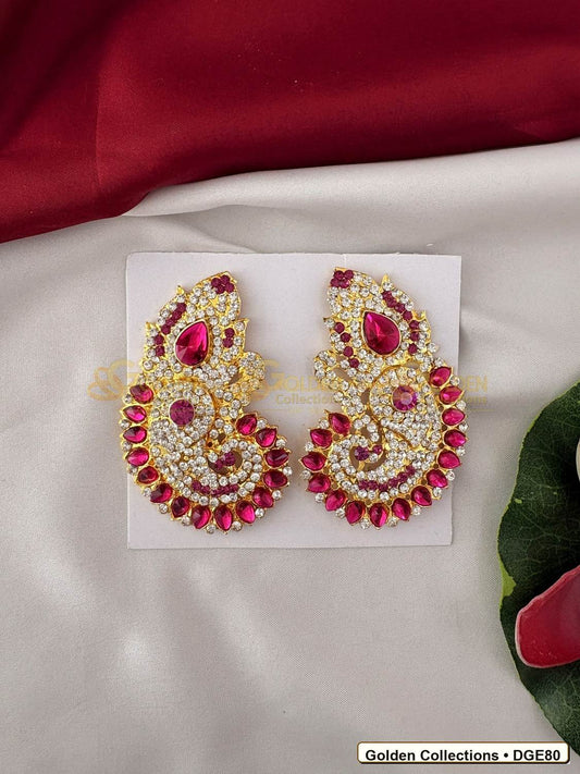 Front view of Ornate Karna Pathakam Deity Earrings Pink Green Stones 3.25 x 2 inches DGE80 from Golden Collections