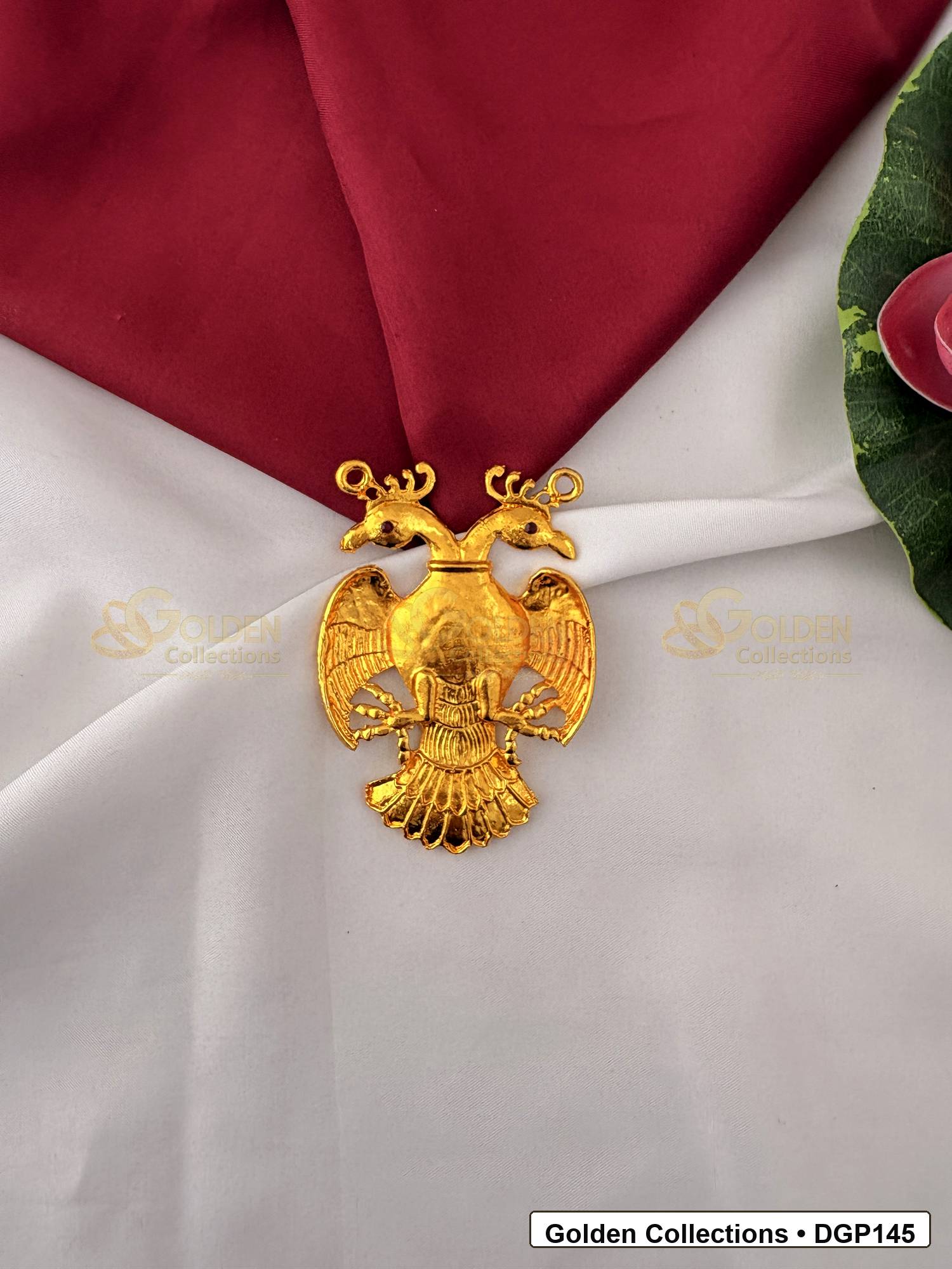 Garuda Motif Deity Pendant for Idol Alankaram front view showing gold-tone Garuda bird motif deity pendant with hanging loop and textured detailing for idol alankaram