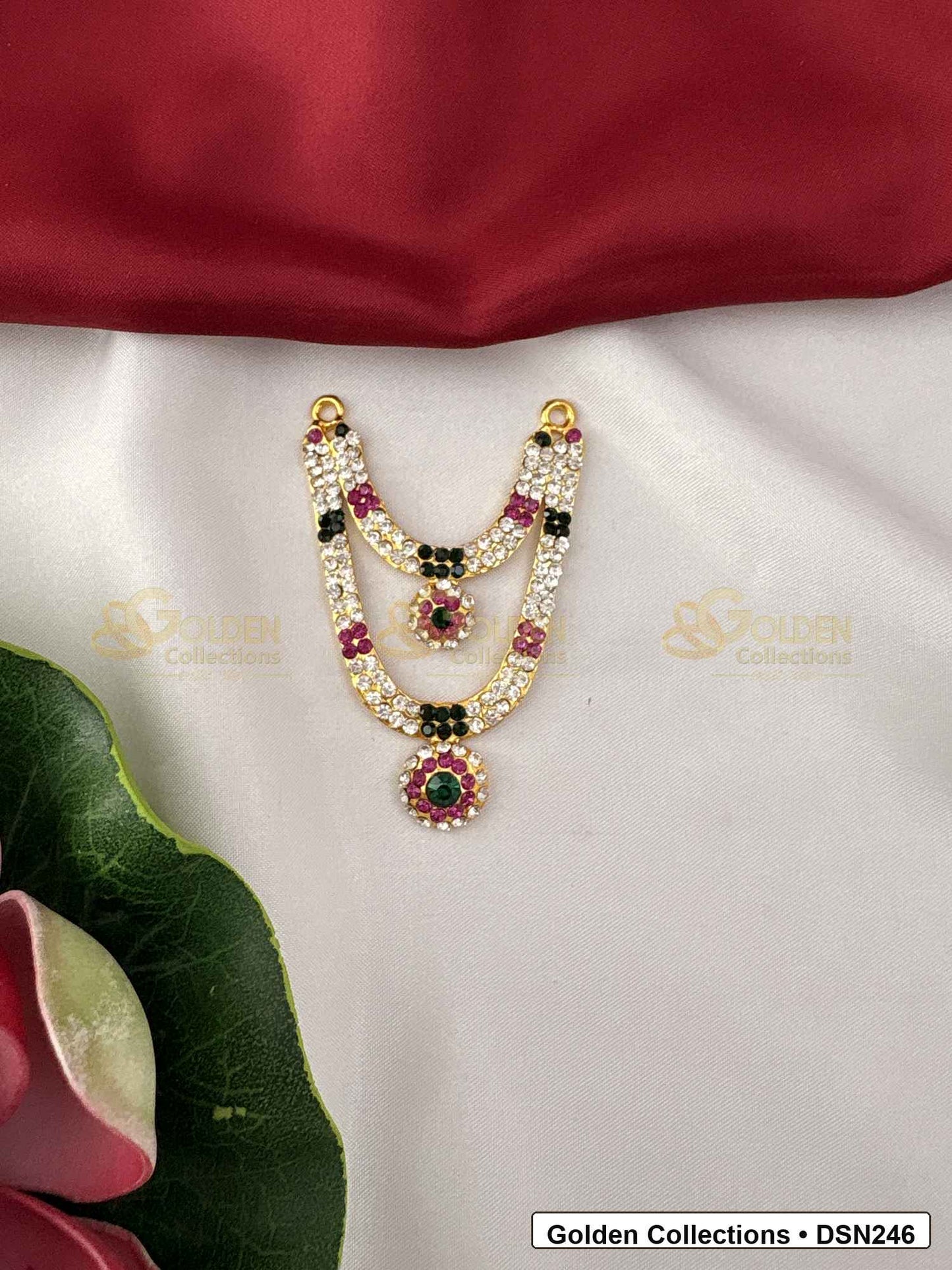 Front view of Goddess Idol 2 Step Short Necklace with Pink Green Stones showing two-step U-shaped short necklace with pink, green and dark accent stones, pearl-like bead rows and a round pink-green pendant