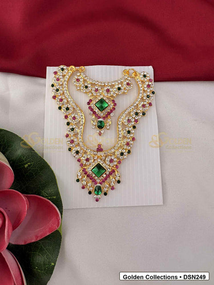 Front view of Goddess Idol Short Necklace with Green Diamond Pendant showing short necklace with green diamond-shaped pendant details, pink accent stones, pearl-like rows and gold-tone setting