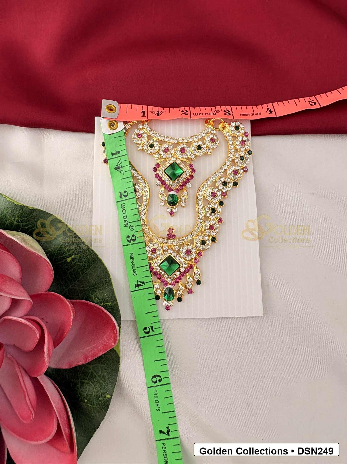 Measurement photo showing 4.25 x 2.25 Inches deity short necklace with measuring tape for goddess idol alankaram