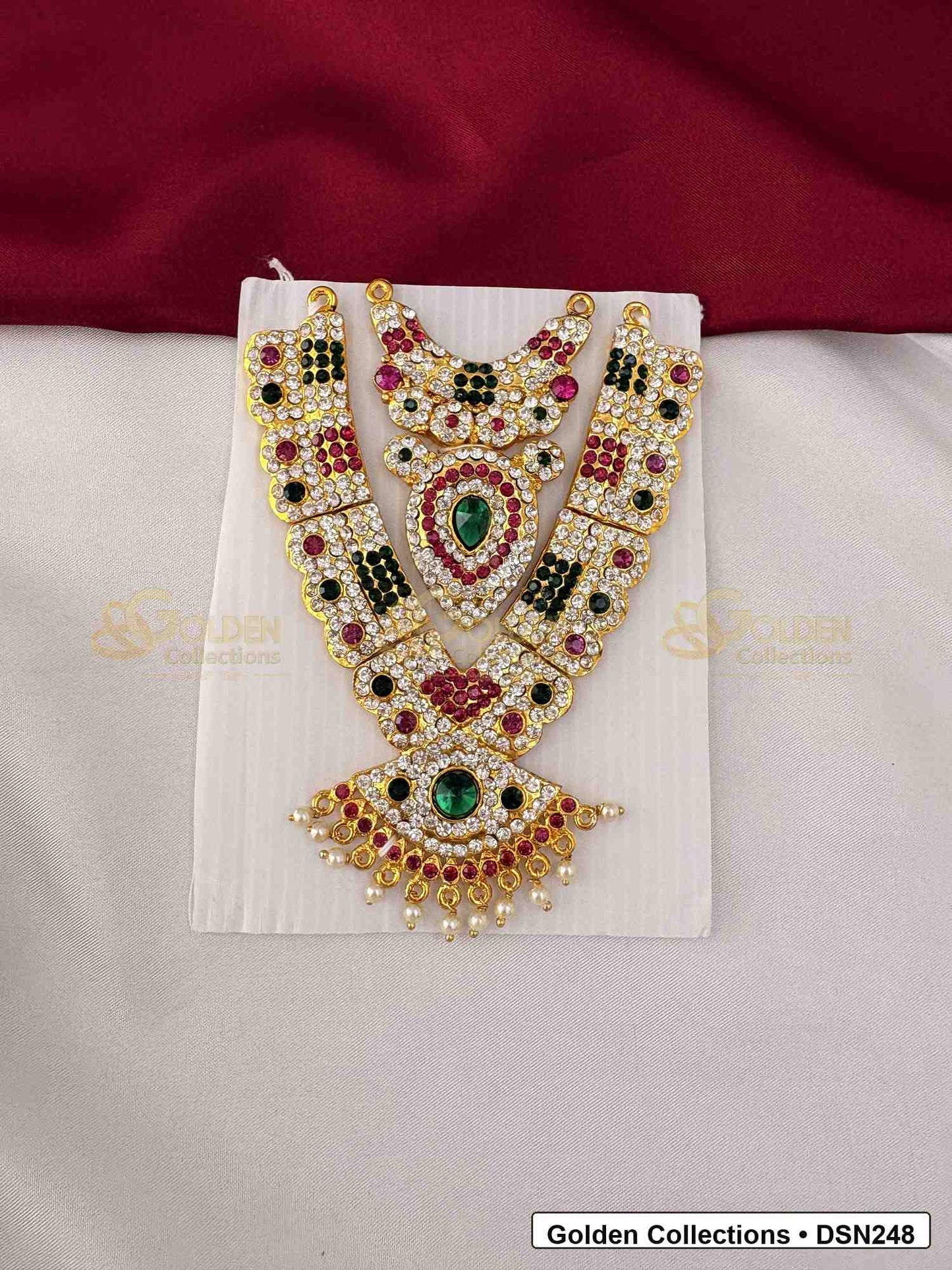 Front view of Goddess Idol Wide Short Necklace with Green Pink Stones showing wider chest-style short necklace with layered pearl-like rows, green and pink center stones and gold-tone finish
