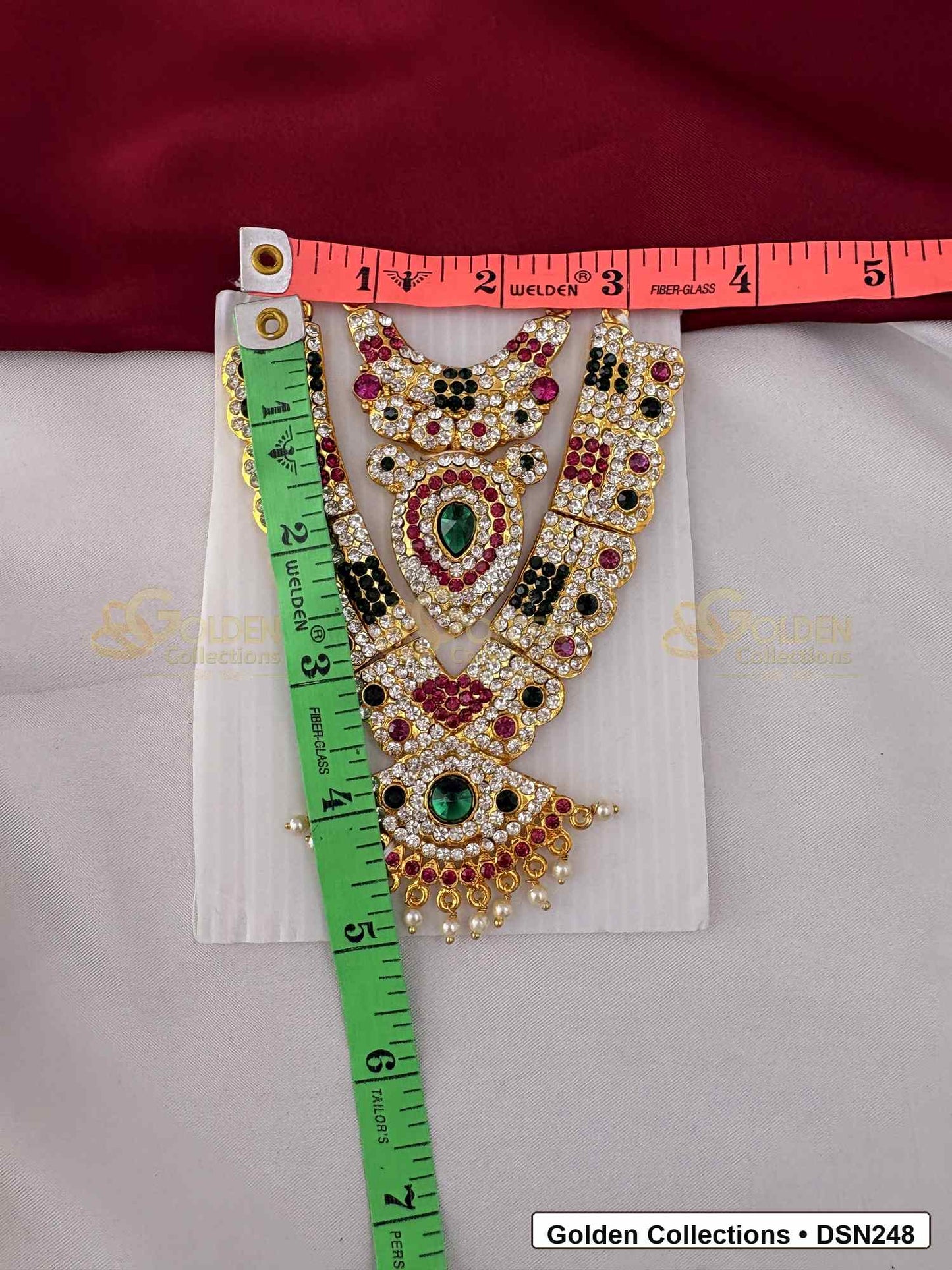 Measurement photo showing 5 x 2.5 Inches deity short necklace with measuring tape for goddess idol alankaram