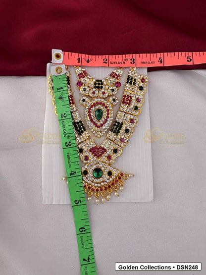 Measurement photo showing 5 x 2.5 Inches deity short necklace with measuring tape for goddess idol alankaram