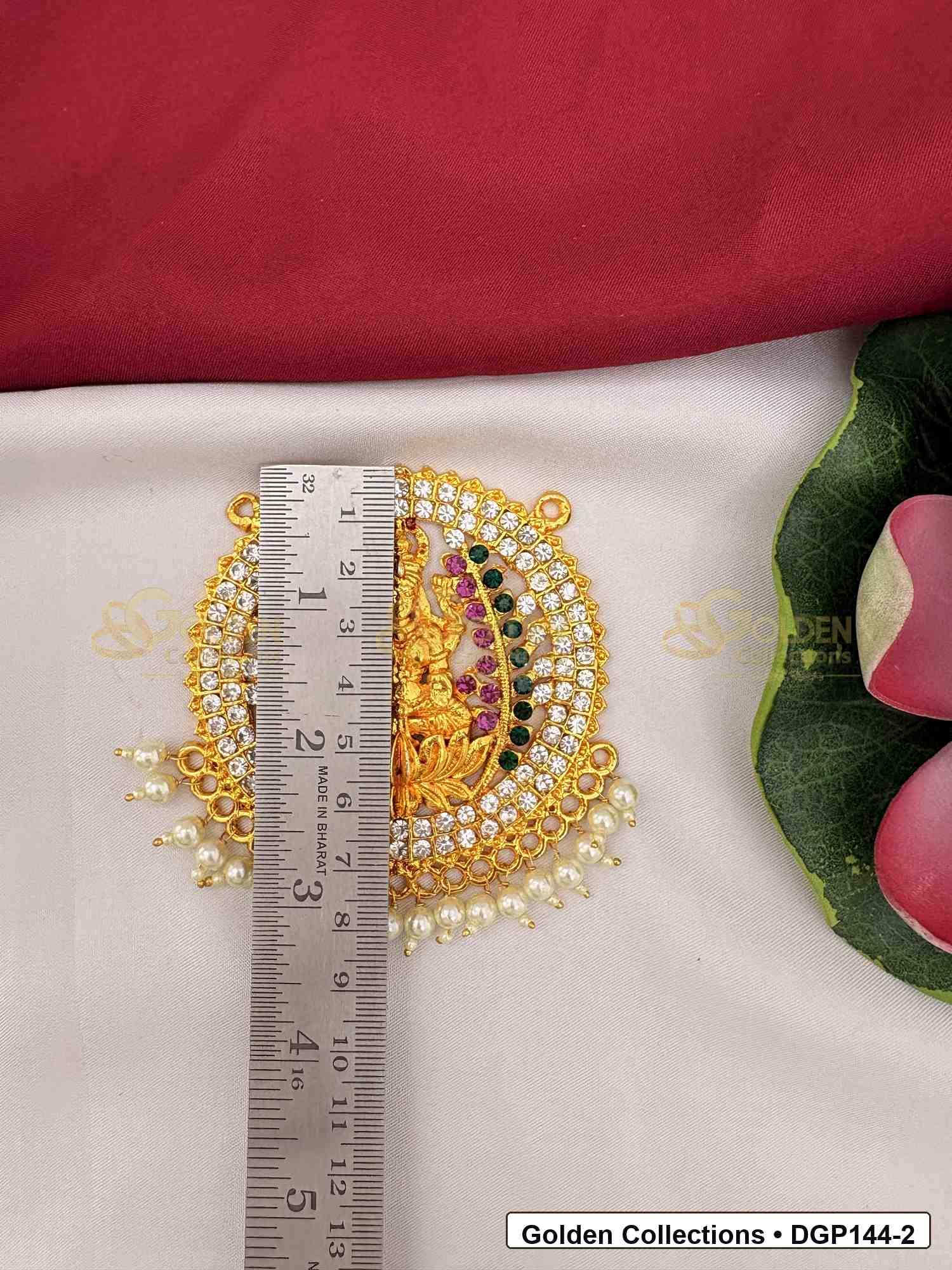 Measurement photo showing 3.25 x 3 Inches goddess motif round deity pendant for idol alankaram with ruler for idol alankaram