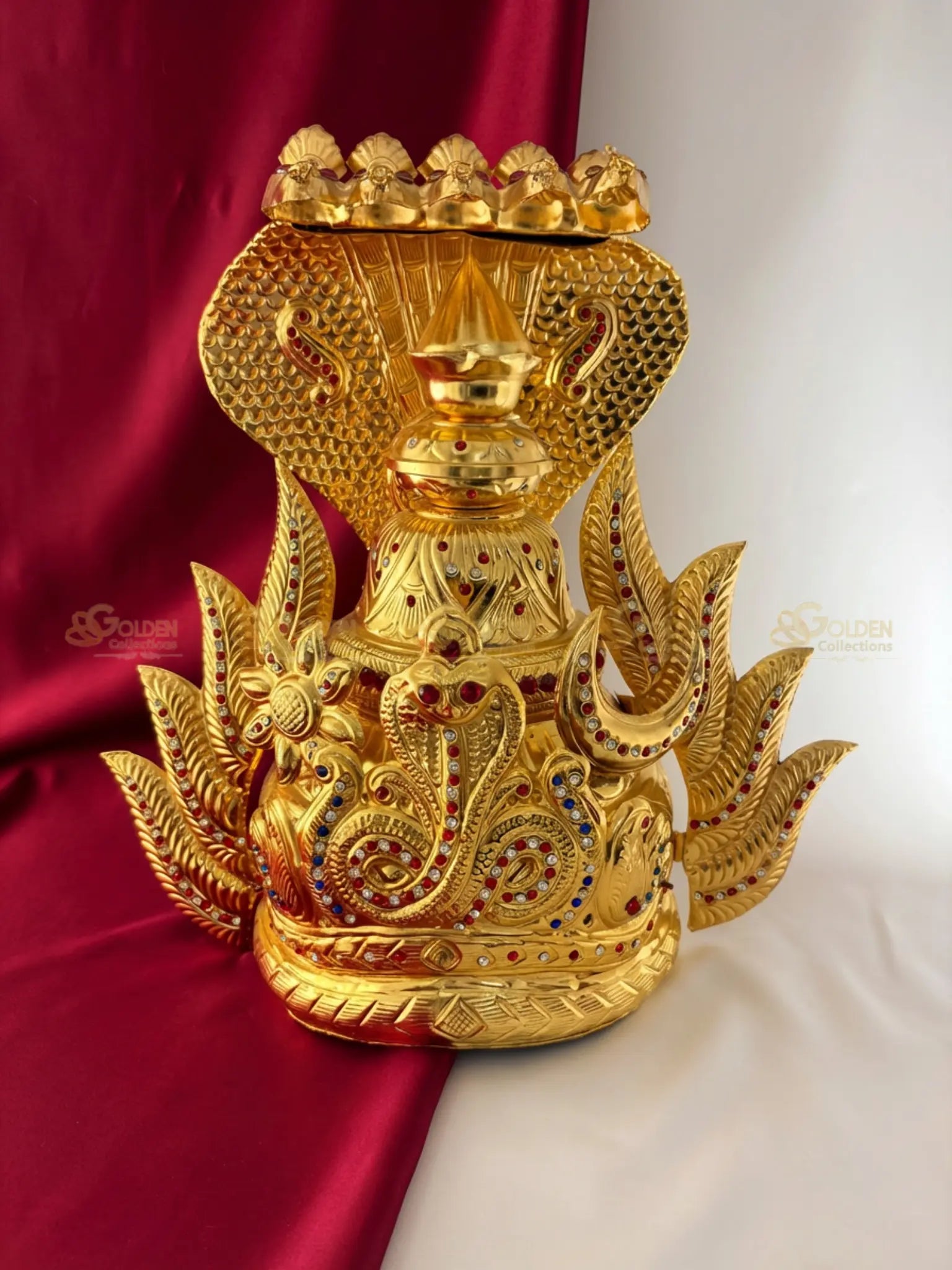 Golden Collections Gold Plated Nagaraja Naga Kireedam Crown - Front view showcasing intricate serpent details and multicolor stone arrangement.