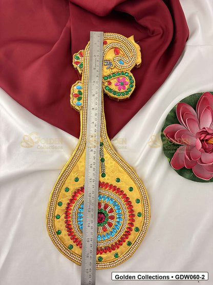 Measurement photo showing 17 x7 Inches gold-plated saraswati veena for idol alankaram for deity idol alankaram