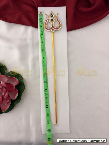 Measurement photo showing 14 Inches gold-tone trishul for idol alankaram with measuring tape for idol alankaram