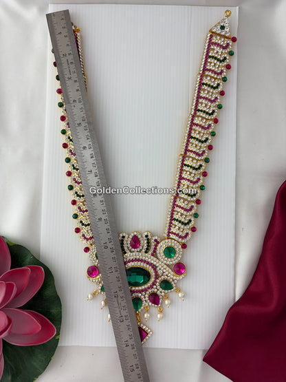 Gold-plated Varalakshmi haram necklace with pink and green stones for Varamahalakshmi alankaram - DLN-207 detail view