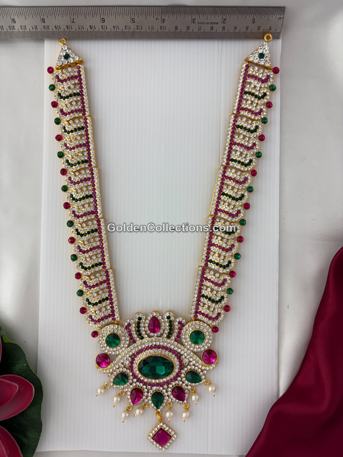 South Indian deity jewellery long necklace with white stone work and green pendant - DLN-207 side view