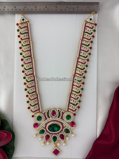 South Indian deity jewellery long necklace with white stone work and green pendant - DLN-207 side view