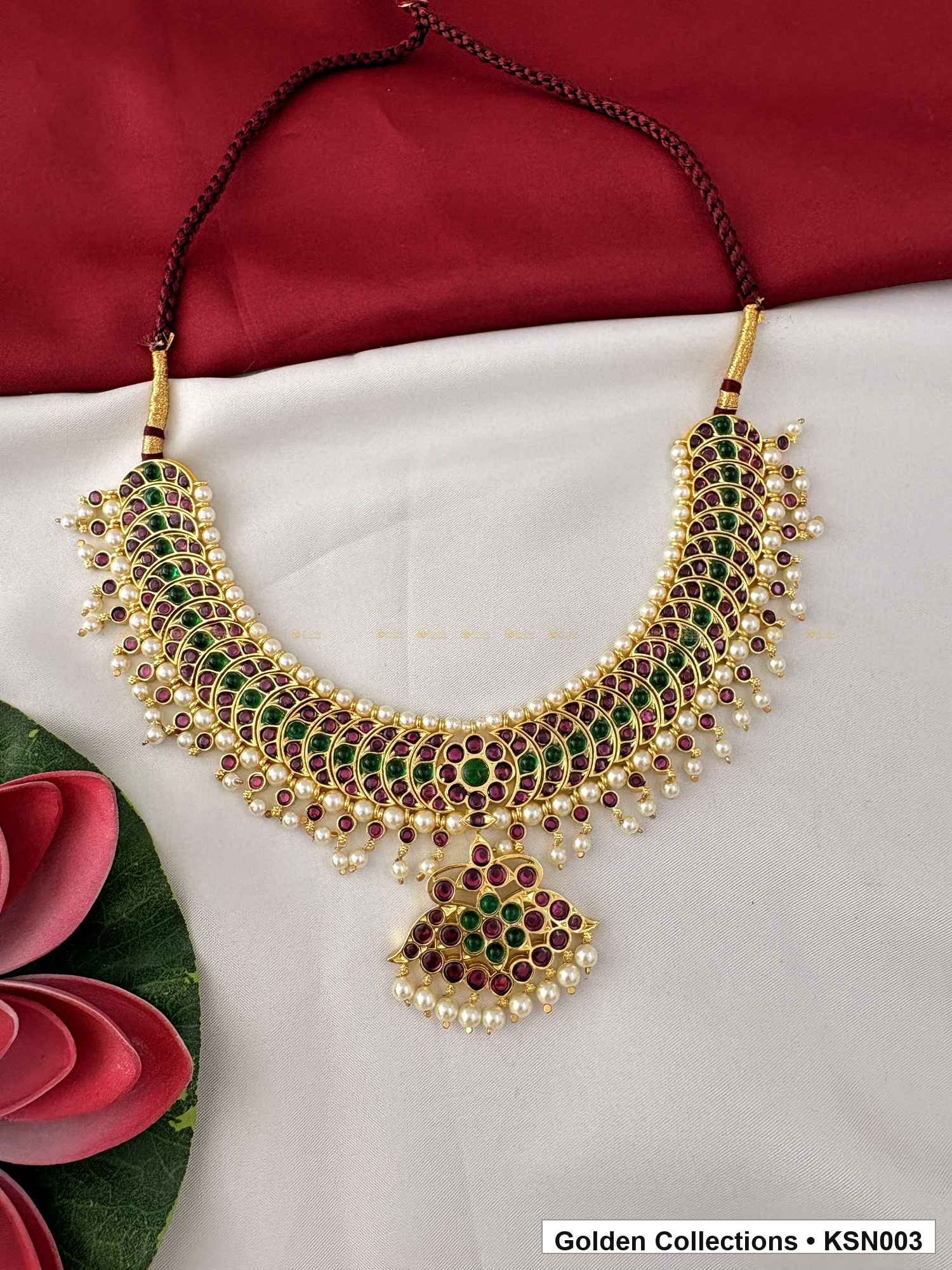 Angled product view of Green Red Stone Real Kemp Crescent Short Necklace from Golden Collections
