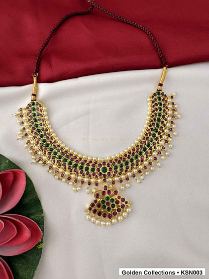 Angled product view of Green Red Stone Real Kemp Crescent Short Necklace from Golden Collections