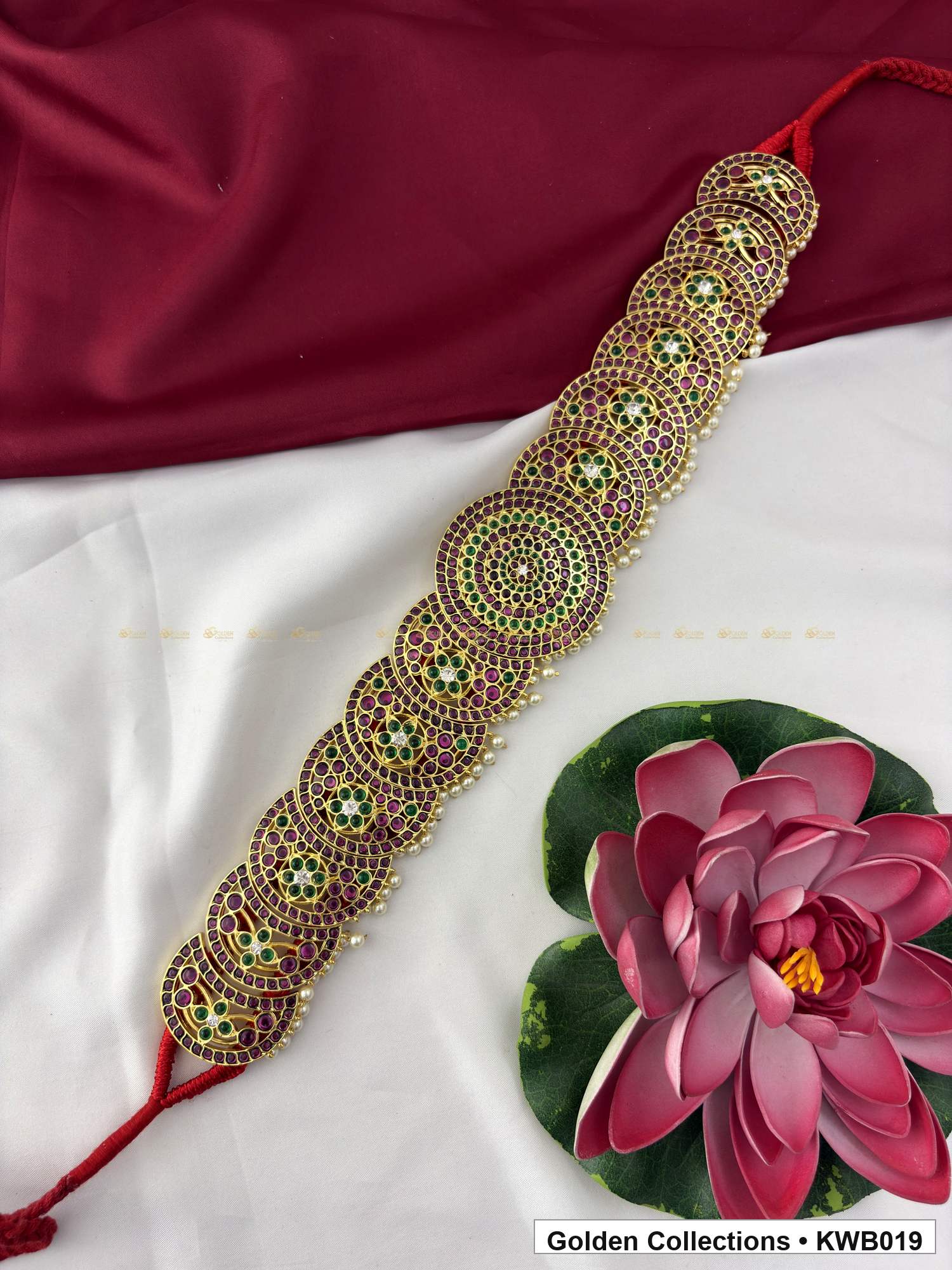 Angled product view of Green Red Stone Real Kemp Vaddanam Waist Belt from Golden Collections