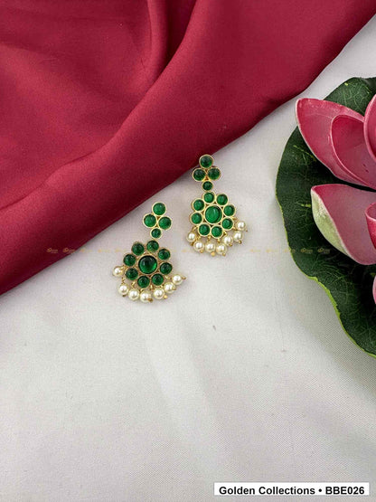 Front view of Green Stone Real Kemp Jhumki Earrings from Golden Collections