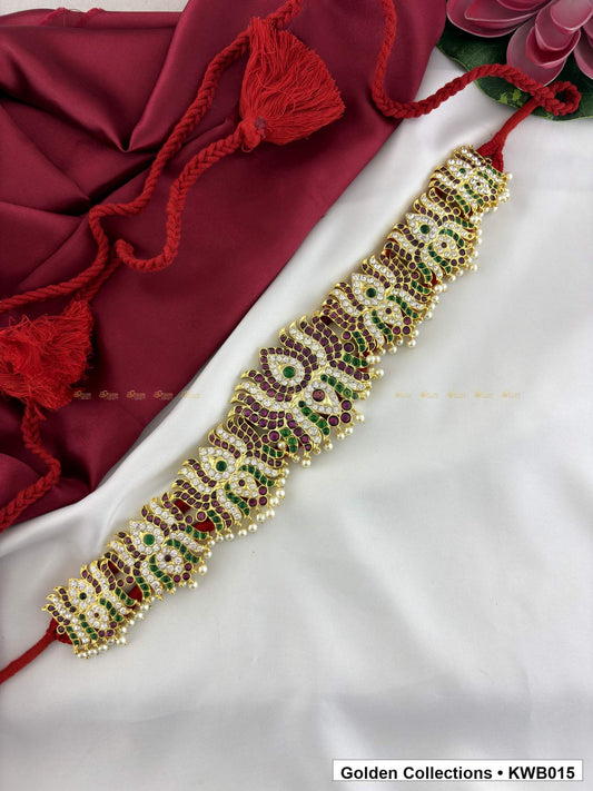 Front view of Green Stone Real Kemp Vaddanam Waist Belt from Golden Collections