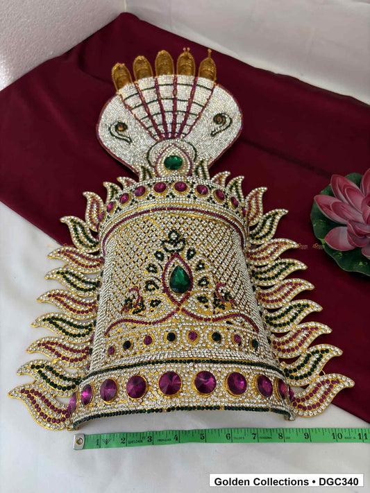 Front view of the half-round deity stone crown with a horizontal tape measure along its base.