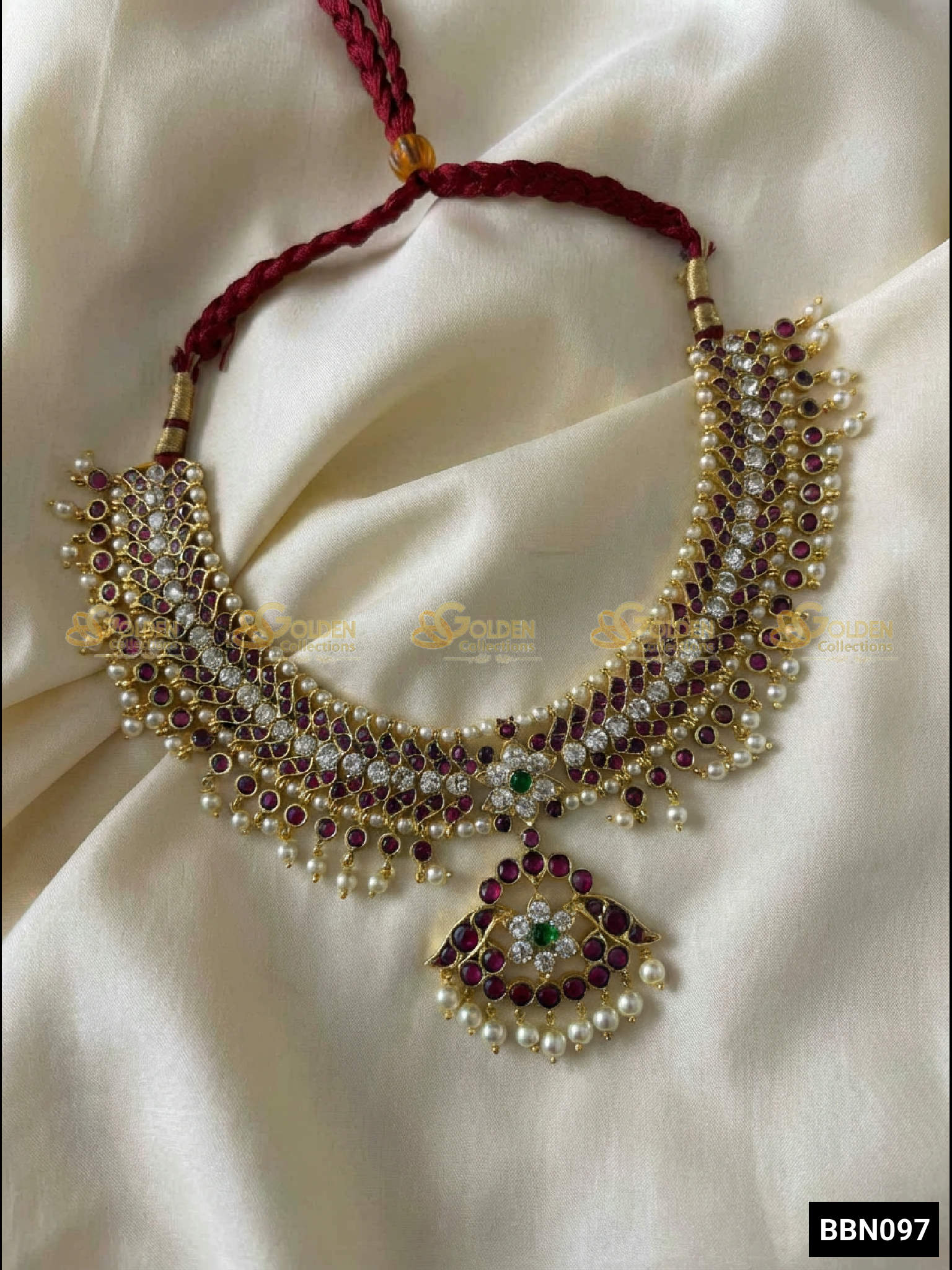Close-up of ruby kemp stones and pearl detailing in Bharatanatyam short necklace Attigai