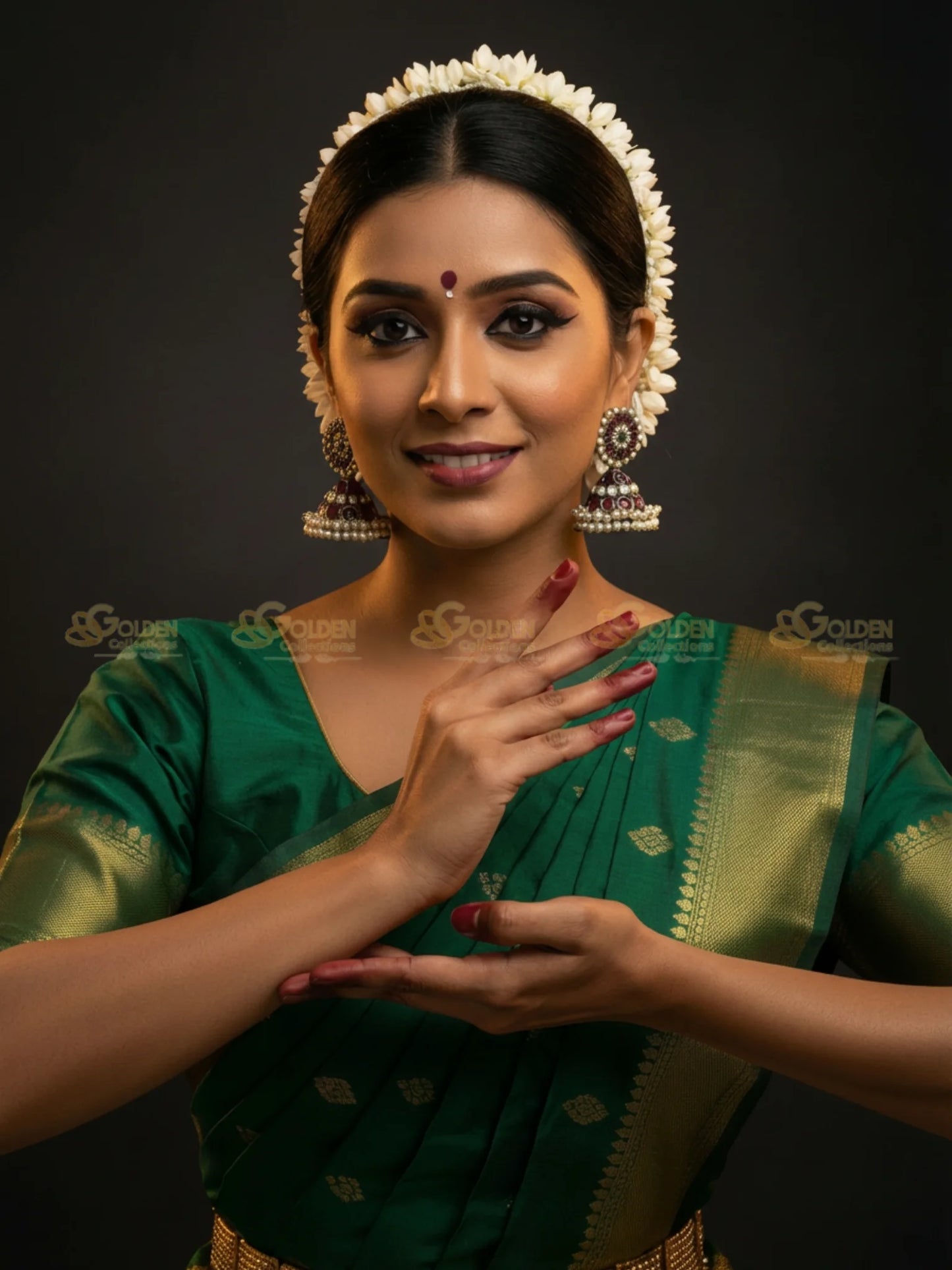 Golden Collections Gold Plated Kemp Black Earrings - Model in Bharatanatyam temple attire posing gracefully.
