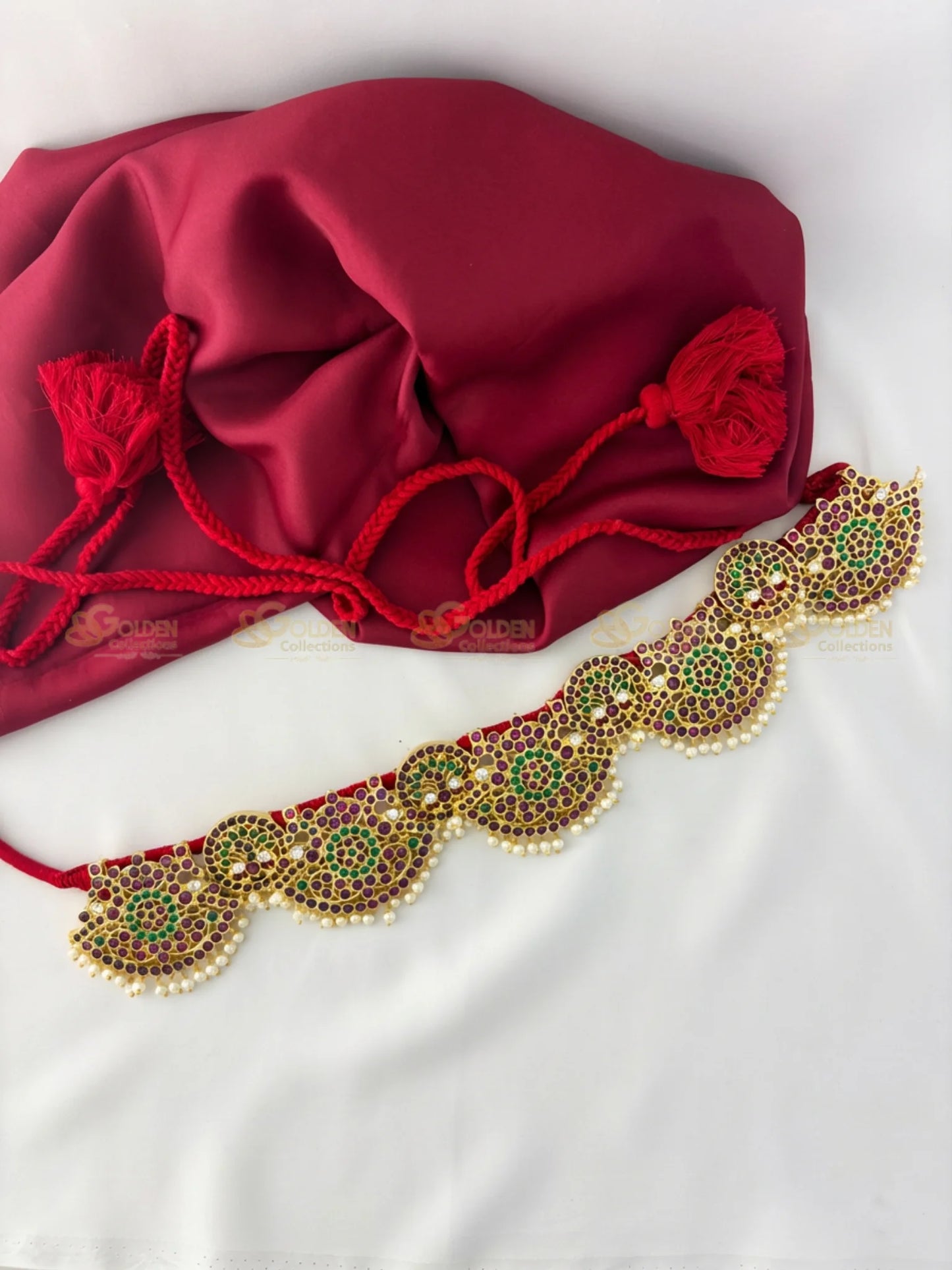 Golden Collections Kemp Petal Design Vaddanam - Angled view displaying the full length of the waist belt and red cord fastening.
