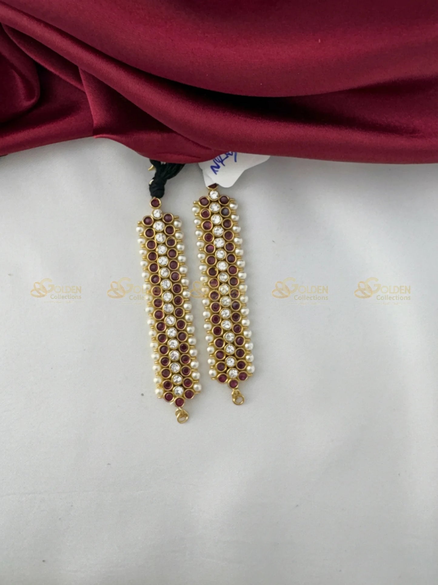 Golden Collections Kemp Ruby and Pearl Mattal – Close-up detail of a single mattal, highlighting the intricate hand-set genuine ruby and pearl arrangement.