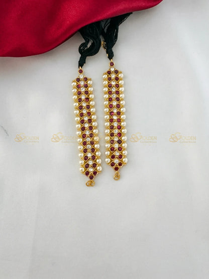 Golden Collections Kemp Glistening Pearl Drop Mattal - Slightly angled view highlighting the antique gold plating and secure black thread ties.