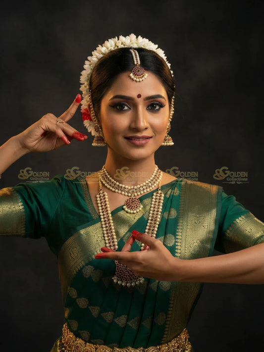 Golden Collections Kemp Mattal Gold earring worn by a model adorned in traditional Bharatanatyam dance attire.