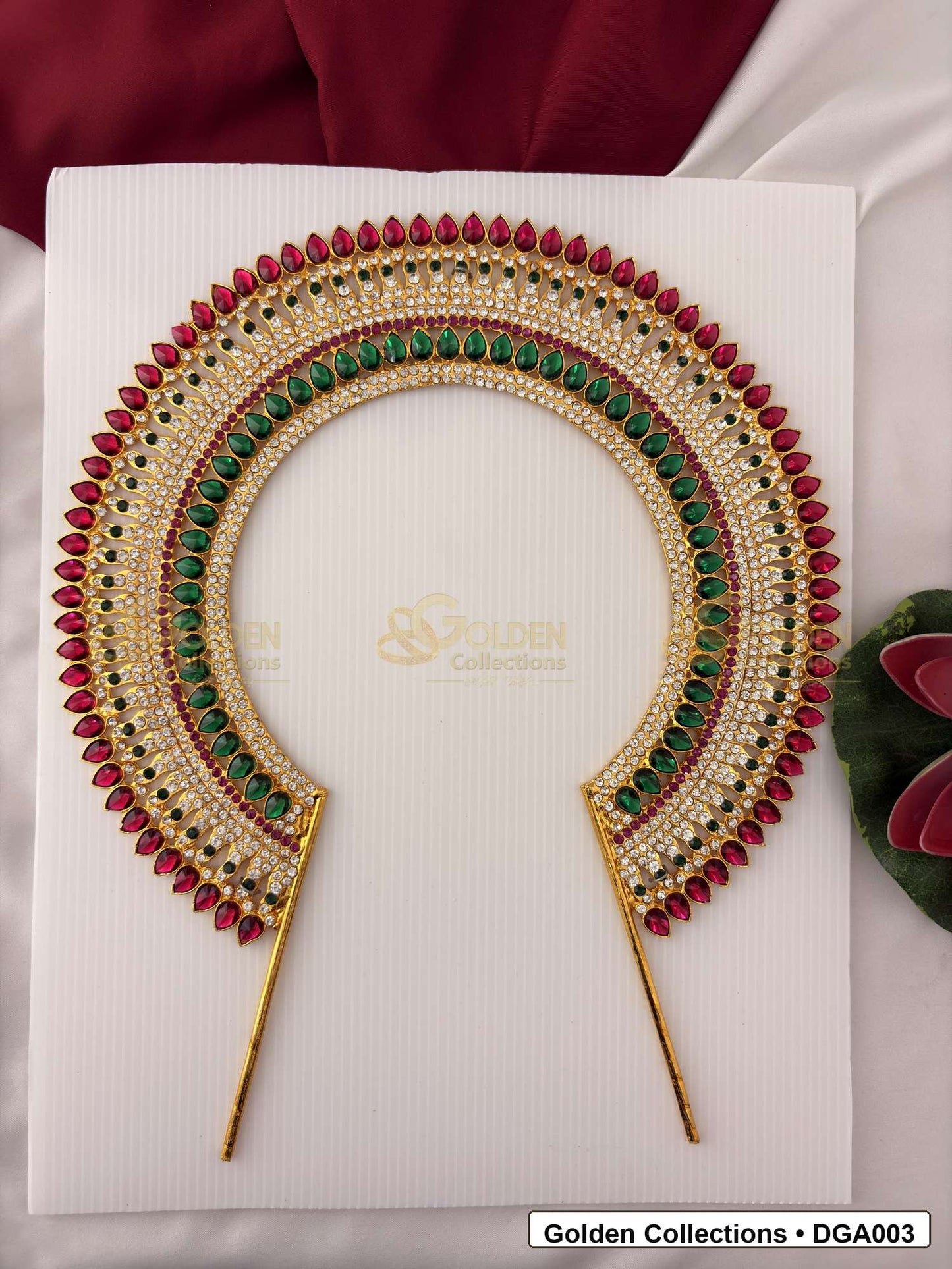 Front view of Large Deity Arch for Idol Alankaram showing gold-plated arch shape with red, green and white stone accents