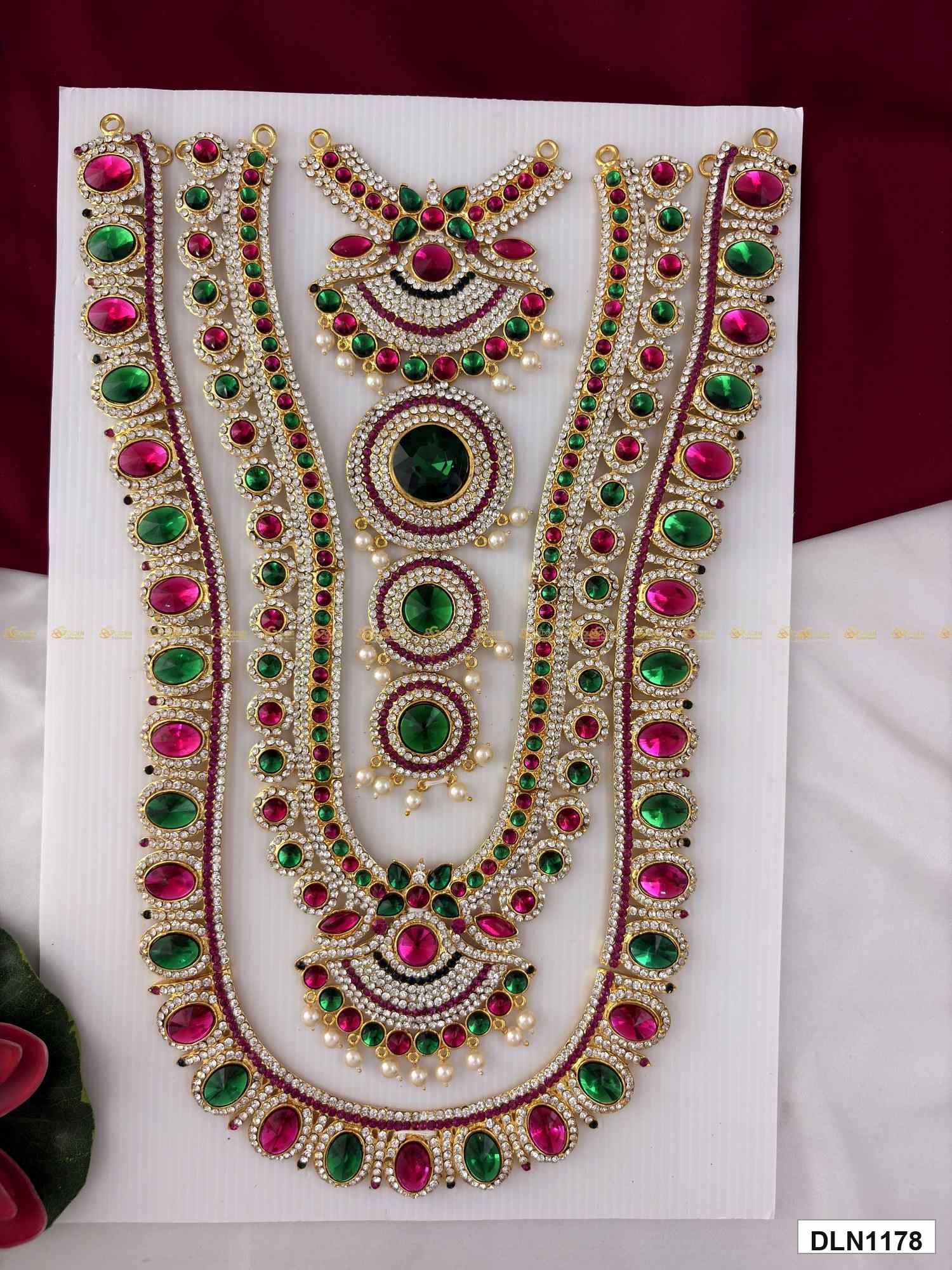 Front view of deity chest long haram with multicolor stones and gold plating for idol alankaram