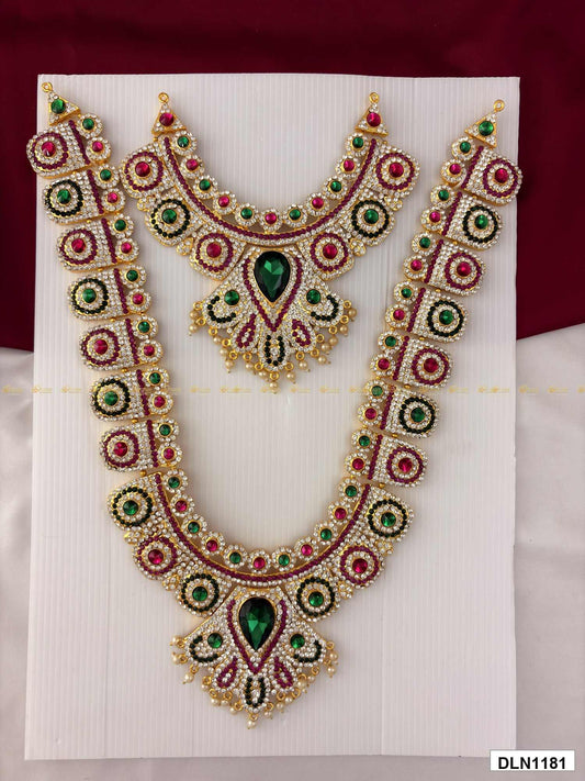 Front view of deity long haram set with multicolor stones and gold plating for idol alankaram
