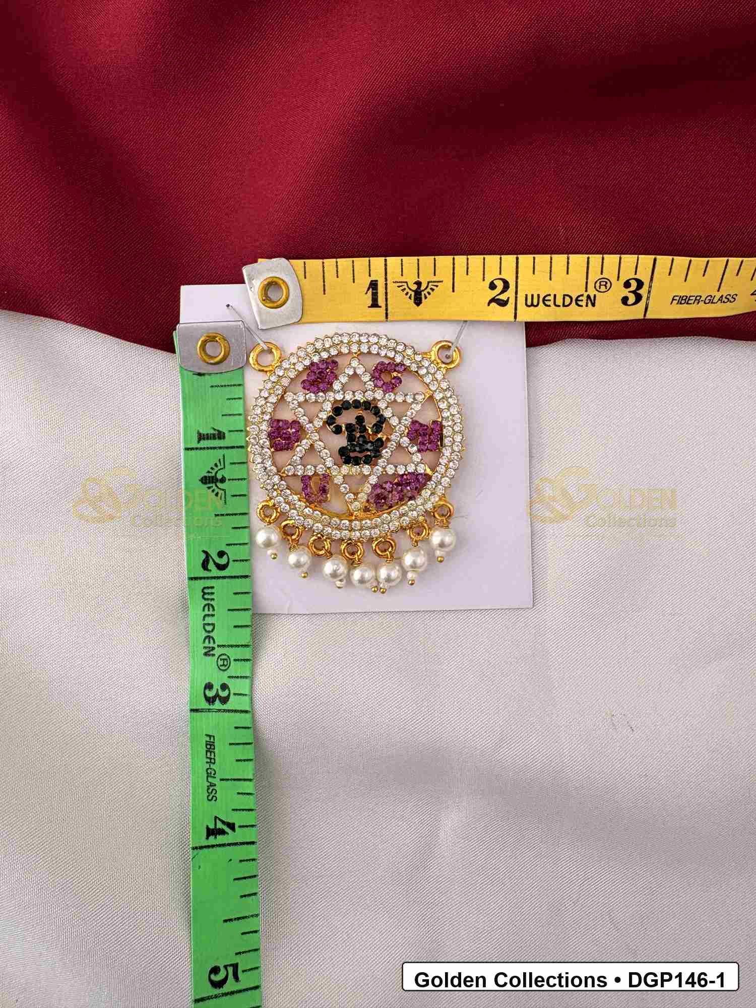 Measurement photo showing 2 x 1.5 Inches om motif round deity pendant for idol alankaram with ruler for idol alankaram