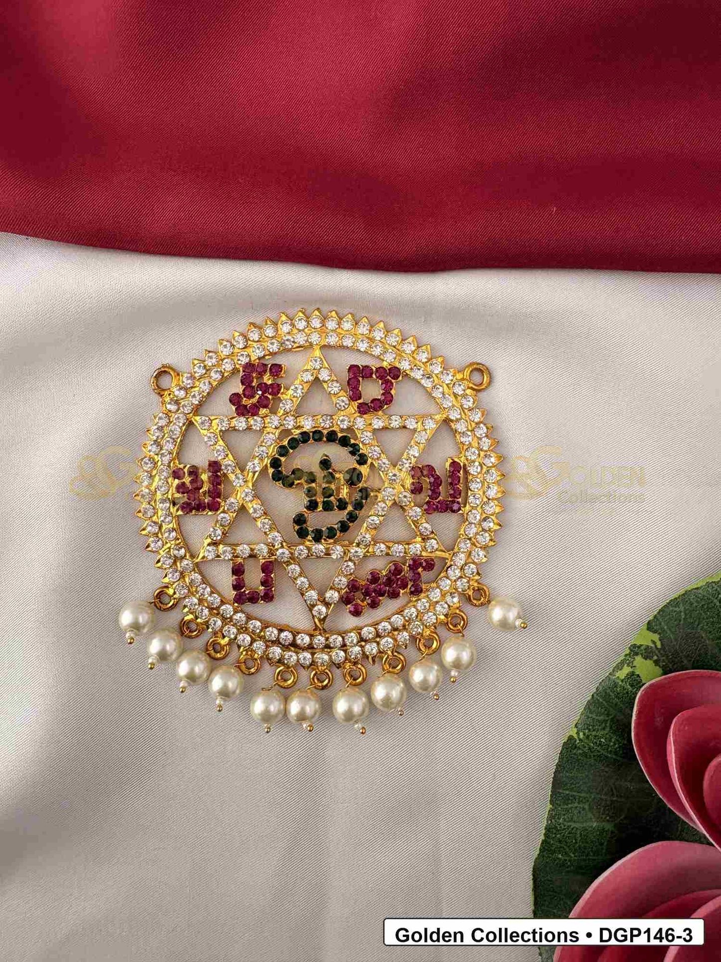 Om Motif Round Deity Pendant for Idol Alankaram front view showing round Om motif deity pendant with red and clear stone work, pearl-style bead edge and gold-tone setting for idol alankaram
